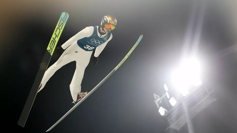 Milano Cortina 2026 Olympics - Ski Jumping - Men's Normal Hill Training - Predazzo Ski Jumping Stadium, Predazzo, Italy - February 5, 2026 Kacper Tomasiak of Poland in action during training REUTERS/Kacper Pempel