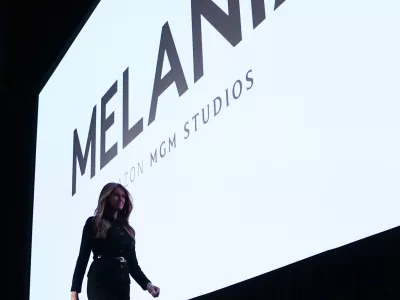 FILE - First lady Melania Trump exits the stage after speaking before the premiere of her movie "Melania" at The John F. Kennedy Memorial Center for the Performing Arts in Washington, Jan. 29, 2026. (AP Photo/Allison Robbert, File)