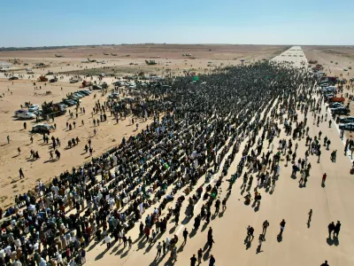 Thousands of Libyans crowd to attend the funeral of Seif al-Islam, son of former Libyan Leader Moammar Gadhafi, in Bani Walid city, Libya, Friday, Feb. 6, 2026. (AP Photo)