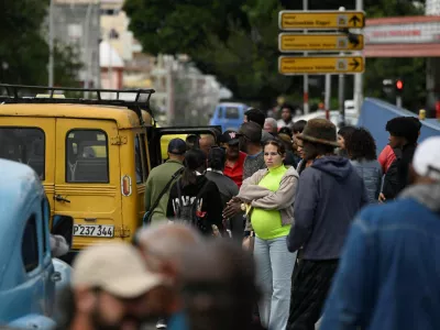 People wait for transportation as Cubans brace for fuel scarcity measures after U.S. tightened oil supply blockade, Havana, Cuba, February 6, 2026. REUTERS/Norlys Perez