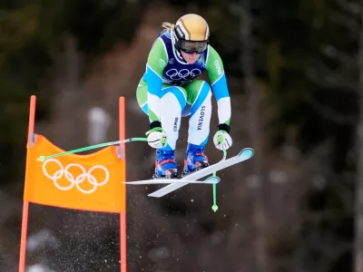 Slovenia's Ilka Stuhec speeds down the course during an alpine ski women's downhill training, at the 2026 Winter Olympics, in Cortina d'Ampezzo, Italy, Saturday, Feb. 7, 2026. (AP Photo/Robert F. Bukaty)