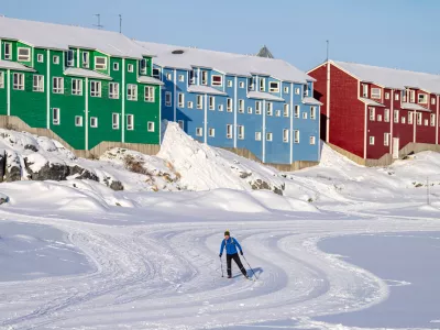 A person skis in Nuuk, Greenland, Friday, Feb. 6, 2026. (Christinne Muschi /The Canadian Press via AP)