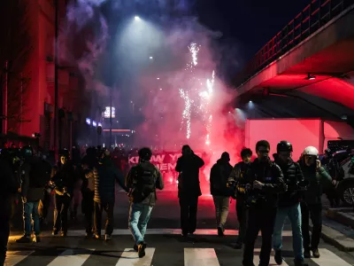 07 February 2026, Italy, Mialn: People clash with police officers during a protest against the Milan Cortina 2026 Winter Olympic Games. Photo: Alessandro Bremec/IPA via ZUMA Press/dpa