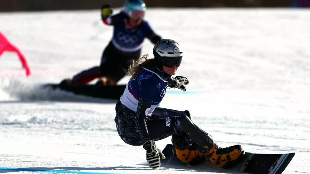 Milano Cortina 2026 Olympics - Snowboard - Women's Parallel Giant Slalom 1/8 Finals - Livigno Snow Park, Livigno, Italy - February 08, 2026. Ester Ledecka of Czech Republic in action during her 1/8 final against Claudia Riegler of Austria in the Women's Parallel Giant Slalom REUTERS/Gonzalo Fuentes