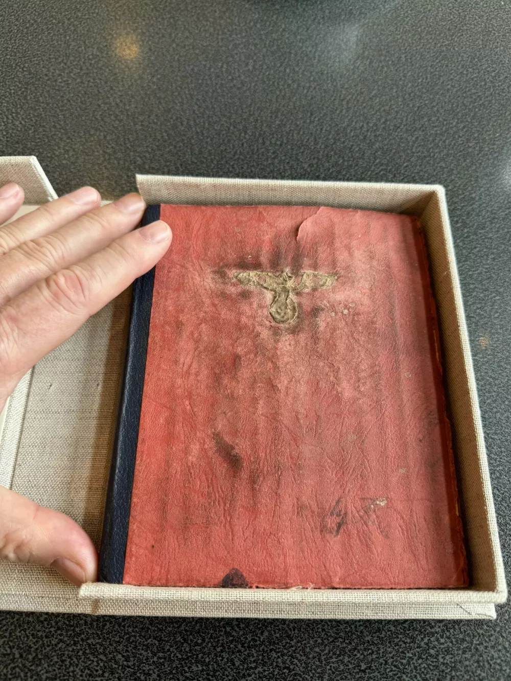 Story from Jam Press (Hitler Notebook Sold)Pictured: The notebook.'G&ouml;ring ate like a pig!' 'Hitler's notebook' sells for Ł26k after being found in atticA diary believed to have been written by Adolf Hitler has been found in an attic and sold for around Ł26,000.It has 113 handwritten pages with references to high-ranking Nazi official Hermann G&ouml;ring and German Hollywood star Marlene Dietrich.In the notebook, Hitler allegedly declared his love for the German actress.This book offers lots of material for speculation, but it has yet to be authenticated as being written by the Nazi leader.An expert at least confirmed that the paper dates from the period.The notebook was first offered to author Olaf Haubold, 74, who was unable to match the seller's asking price.He then brokered a deal with a collector he knew, who ended up paying a reported fee of around Ł26,000 (&euro;30,000).Olaf, who lives in Thuringia, told What's The Jam: "In 2008, an elderly gentleman came to my office and offered me documents from Adolf Hitler's estate."It seemed suspicious to me at first, but I asked him to show me a sample."He then came with a notebook and several documents that initially appeared to be authentic."Because I lack expertise in this area, I sought help from historians, and we concluded that there was a possibility of its authenticity."But the asking price was too high for me, given the uncertainties."At the time, I knew a wealthy collector who had also sponsored some of my projects."He was prepared to pay the asking price for the entire collection."I don't know the exact fee, the price mentioned in reports is an estimate."The seller said he found the notebook in an attic, but Olaf wasn't convinced that part was true.He said: "The gentleman who offered the collection didn't want to say anything about its origin."The 'attic find' explanation was too vague for us."Some documents bear stamps of the Ministry for State Security of the former GDR, otherwise known as the Stasi."It's possible it came from somewhere like that."After brokering the sale, Olaf secured the rights to use the collection for his 2025 book 'The Collection &ndash; Hitler's Secret Records'.He was granted permission to analyse the material with East German writer Martin Stade before his death in 2018.The buyer has also passed away since procuring the notebook, and it is now owned by his children.Olaf said: "I only have the publication rights from the collector and now from his heirs."The collection is still complete and has not yet been offered publicly at auction or in any other way."The notebook is old; whether it contains Hitler's handwriting is unproven."Despite the uncertainties, I decided to publish the material."The esteemed reader may form their own opinion."In his own opinion, Olaf said it's "very likely" the work was produced by Hitler's hand.In the first pages, Hitler is quoted as criticising the Reich Chancellery before moving in."The building is in a state of complete decay. Ceiling and floor are rotten. Wallpaper and flooring are decayed."The highlight was a bath in the bathroom. Should I bathe in everyone's sewage? Never!"After a birthday party, he is said to have written the following about his deputy: "G&ouml;ring ate like a pig again."And about Marlene Dietrich, he said: "I have to try to bring her back to Germany."I've had all of Dietrich's new films sent to me."I think I've fallen in love with her."Eva doesn't stand a chance against Dietrich."But I won't let on. The woman has to come to Germany, even if it's by force. I'll set the intelligence service on her."Dietrich is hanging around with the Americans now. I'll write her another letter."The best thing would be to offer her money. Women will do anything for money, you can see that with Eva."I'll use Eva as a test subject and study her behaviour."I'm going to make Dietrich a money offer and see if she takes the bait."So, let's get to work. Because I am the F&uuml;hrer."The secret service says it won't be so easy to get hold of Dietrich."What is easy anyway! I told them to put in the effort. I want to see results."That's what they're paid for, and not badly at that."It's not the first time a journal has been attributed to Adolf Hitler.In 1983, the German magazine Stern bought the 'Hitler Diaries', a series of 60 volumes of journals allegedly written by the Nazi leader.But they were later found to have been forged and two men were convicted of defrauding Stern of 9.3 million Deutsche Marks, about Ł2.3 million.The case provided the basis for the 1992 film Schtonk!'ENDS,Image: 1067280483, License: Rights-managed, Restrictions:, Model Release: no