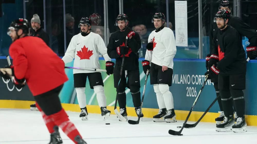 Milano Cortina 2026 Olympics - Ice Hockey - Men's - Canada Training - Milano Santagiulia Ice Hockey Arena, Milan, Italy - February 08, 2026. Brandon Hagel of Canada and Josh Morrissey of Canada during training REUTERS/Mike Segar