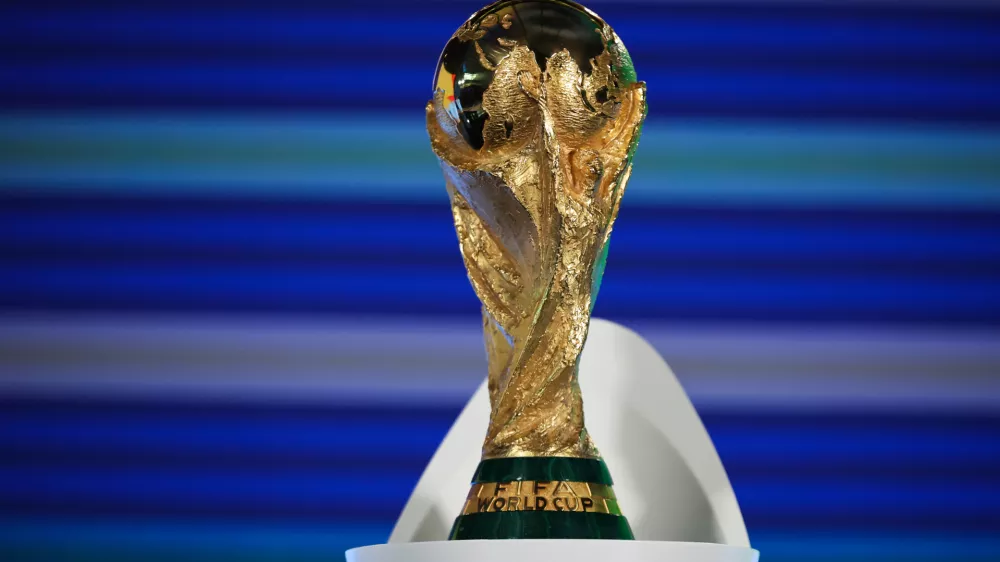 FILED - 13 December 2024, Switzerland, Zuerich: The FIFA World Cup 2026 trophy is on display ahead of the draw ceremony for the 2026 World Cup Europe qualifiers. Photo: Christian Charisius/dpa