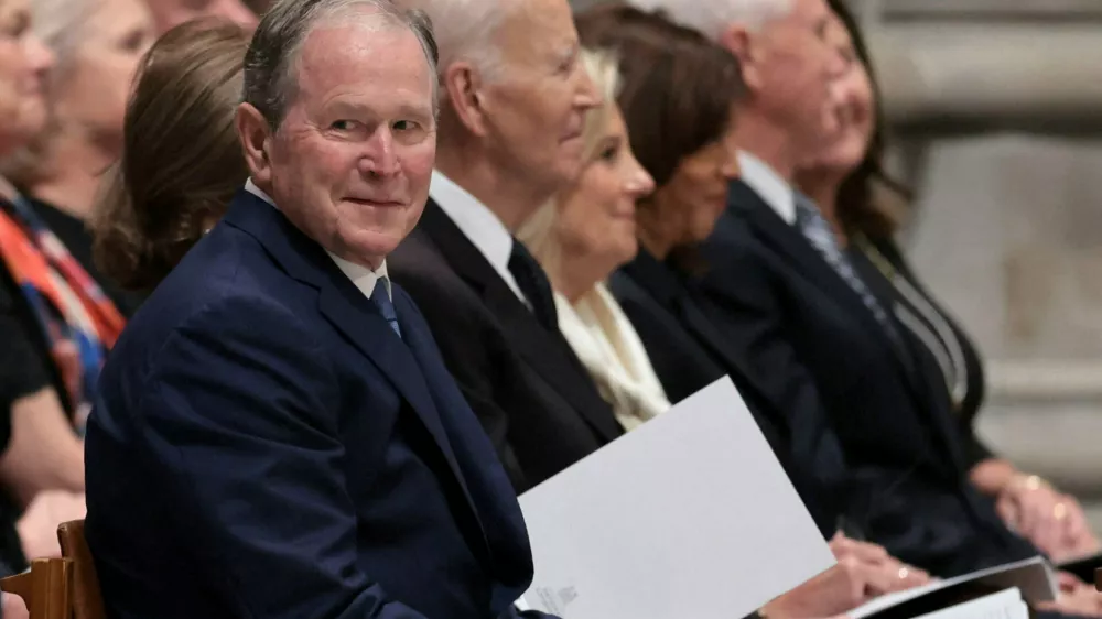 Former U.S. Presidents George W. Bush and Joe Biden, and former Vice Presidents Kamala Harris and Mike Pence attend a funeral service for former U.S. Vice President Dick Cheney at Washington National Cathedral in Washington, D.C., U.S., November 20, 2025. REUTERS/Jonathan Ernst