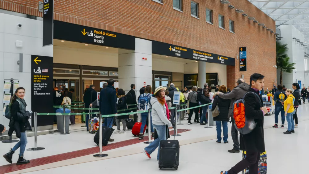 Venice,Italy on 28th Mar 2018: Passengers at the modern interior of Marco Polo International Airport in Venice