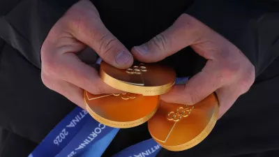 Milano Cortina 2026 Winter Olympics - Alpine Skiing - Photocall with Franjo von Allmen - Stelvio Ski Centre, Bormio, Italy - February 12, 2026 Franjo von Allmen of Switzerland holds his gold medals for photograph REUTERS/Denis Balibouse