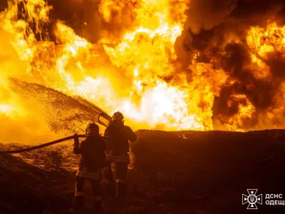 Firefighters work at the site of a railway infrastructure facility hit during overnight Russian drone strikes, amid Russia's attack on Ukraine, in Odesa, Ukraine February 15, 2026. Press service of the State Emergency Service of Ukraine in Odesa region/Handout via REUTERS ATTENTION EDITORS - THIS IMAGE HAS BEEN SUPPLIED BY A THIRD PARTY. DO NOT OBSCURE LOGO.   TPX IMAGES OF THE DAY