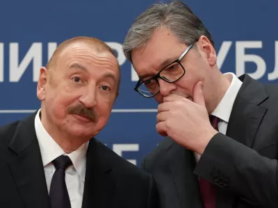 Azerbaijan President Ilham Aliyev, left, speaks with Serbian President Aleksandar Vucic during a news conference in the Serbia Palace in Belgrade, Serbia, Sunday, Feb. 15, 2026. (AP Photo/Darko Vojinovic)