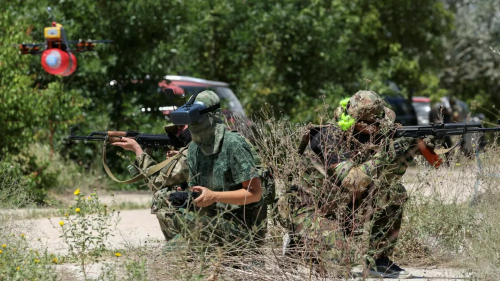 Members of a Russian territorial defence female unit operate FPV drones and practise battle tactics while training at a firing ground near Yevpatoriya, Crimea, July 22, 2023. REUTERS/Alexey Pavlishak