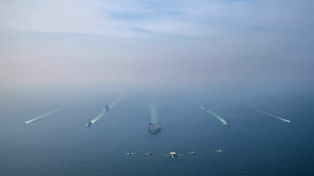 The U.S. Navy's Nimitz-class aircraft carrier USS Abraham Lincoln leads its strike group during a photo exercise in the Arabian Sea, February 6, 2026. U.S. Navy/Mass Communication Specialist 1st Class Jesse Monford/Handout via REUTERS THIS IMAGE HAS BEEN SUPPLIED BY A THIRD PARTY