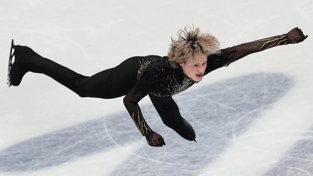 Ilia Malinin of the United States competes during the men's free skate program in figure skating at the 2026 Winter Olympics, in Milan, Italy, Friday, Feb. 13, 2026. (AP Photo/Francisco Seco)