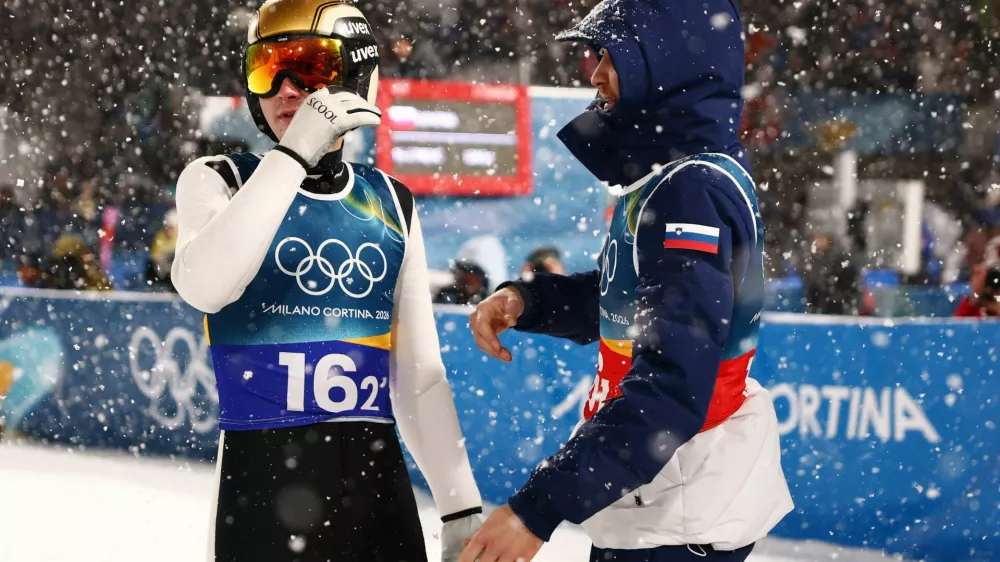 Milano Cortina 2026 Olympics - Ski Jumping - Men's Super Team - Predazzo Ski Jumping Stadium, Predazzo, Italy - February 16, 2026. Domen Prevc of Slovenia and Anze Lanisek of Slovenia during the final round REUTERS/Kacper Pempel