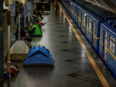 Residents take shelter inside a metro station during an air raid alert, amid Russia's attack on Ukraine, as overnight Russian drone and missile strike continues across the country, in Kyiv, Ukraine, February 17, 2026. REUTERS/Alina Smutko