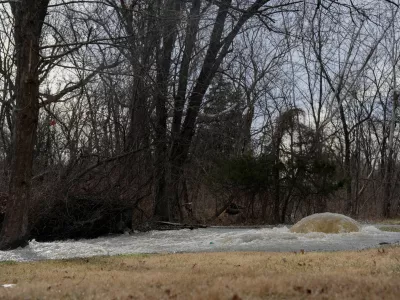 Untreated sewage spills out of the collapsed Potomac Interceptor sewer line next to the Clara Barton Parkway in Bethesda, Maryland, U.S., January 23, 2026. REUTERS/Leah Millis