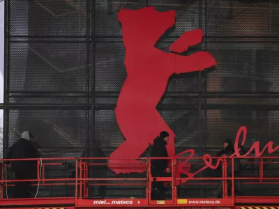 FILE PHOTO: Workers mount the bear logo at the venue entrance of the "Berlinale Palast" for the upcoming Berlinale International Film Festival in Berlin, Germany, February 6, 2026. REUTERS/Liesa Johannssen/File Photo