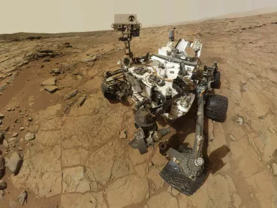 NASA's Mars rover Curiosity is pictured in this February 3, 2013 handout self-portrait obtained by Reuters February 9, 2013. The image was made by combining dozens of exposures taken by the rover's Mars Hand Lens Imager (MAHLI). The rover is positioned at a patch of flat outcrop called "John Klein," which was selected as the site for the first rock-drilling activities by Curiosity. The rover's robotic arm is not visible in the mosaic. MAHLI, which took the component images for this mosaic, is mounted on a turret at the end of the arm. The arm was positioned out of the shot in the images or portions of images used in the mosaic. REUTERS/NASA/Handout.  (UNITED STATES - Tags: SCIENCE TECHNOLOGY) FOR EDITORIAL USE ONLY. NOT FOR SALE FOR MARKETING OR ADVERTISING CAMPAIGNS. THIS PICTURE WAS PROCESSED BY REUTERS TO ENHANCE QUALITY. AN UNPROCESSED VERSION WILL BE PROVIDED SEPARATELY