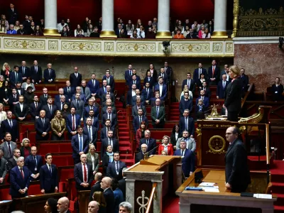 Members of parliament and members of the French government attend a minute of silence in tribute to Quentin Deranque, a young far-right activist who died from injuries after a violent assault in Lyon, before the questions to the government session at the National Assembly in Paris, France, February 17, 2026. REUTERS/Sarah Meyssonnier