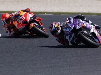 FILE PHOTO: MotoGP - Australian Grand Prix - Phillip Island Grand Prix Circuit, Phillip Island, Australia - October 16, 2022 Pramac Racing's Jorge Martin and Repsol Honda Team's Marc Marquez in action during the MotoGP race REUTERS/Loren Elliott/File Photo