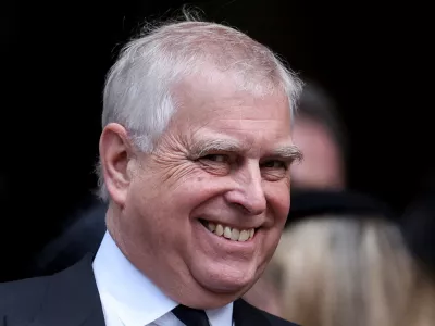 FILE PHOTO: Britain's Prince Andrew reacts at the end of the Requiem Mass, on the day of the funeral of Britain's Katharine, Duchess of Kent, at Westminster Cathedral in London, Britain, September 16, 2025. REUTERS/Toby Melville/File Photo