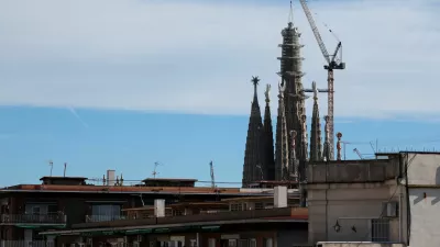 Workers place the upper arm on the cross on the tower of Jesus Christ basilica, which is the tallest piece at Sagrada Familia basilica as part of construction works aimed to be fully finished in this year, in Barcelona, Spain February 20, 2026. REUTERS/Nacho Doce