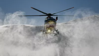 A Securite Civile helicopter (emergency management) lands at the Alpe d'Huez altiport rescue station, French Alps, after dropping off members of the CRS Alpes Grenoble mountain rescue team for an avalanche emergency response rescue mission on January 29, 2026.,Image: 1070577629, License: Rights-managed, Restrictions:, Model Release: no