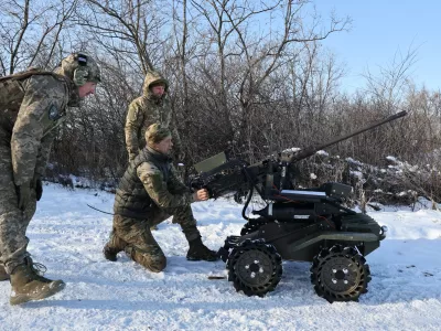 In this photo provided by Ukraine's 65th Mechanized Brigade press service, soldiers test land drones in Zaporizhzhia region, Ukraine, Monday, Jan. 26, 2026. (Andriy Andriyenko/Ukraine's 65th Mechanized Brigade via AP)