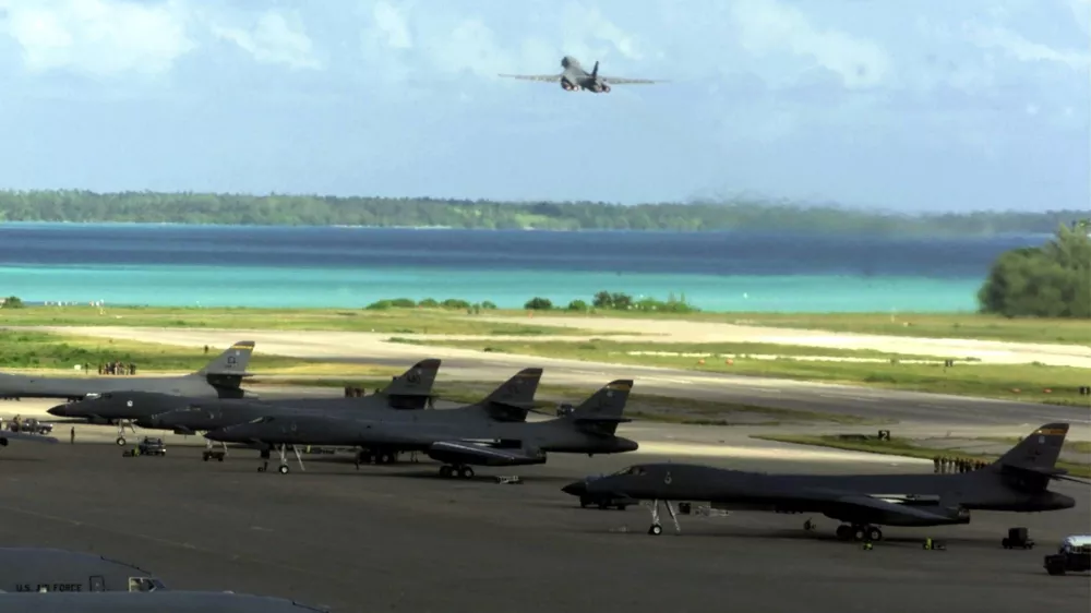 B-1 accelerates for take off (background), during Operation Enduring Freedom. United States Air Force photograph by: SrA Rebeca M. Luquin.