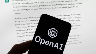 FILE - The OpenAI logo is displayed on a mobile phone in front of a computer screen with output from ChatGPT, March 21, 2023, in Boston. (AP Photo/Michael Dwyer, File)