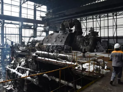 Workers repair the destroyed DTEK company's power plant after a recent Russian missile attack on the country's energy system in an undisclosed location in Ukraine Friday, Jan. 23, 2026. (AP Photo/Mykola Tys)
