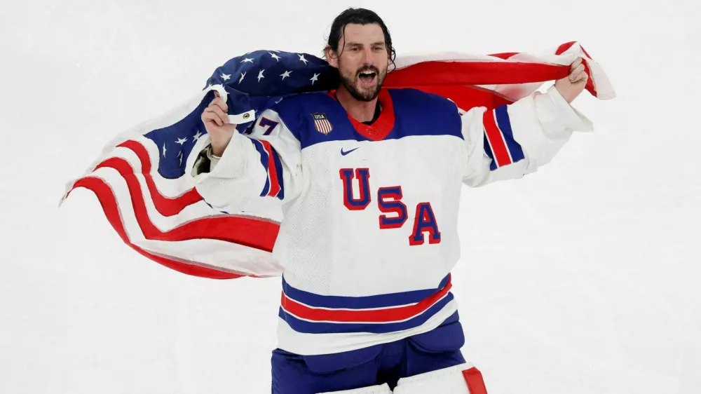 Milano Cortina 2026 Olympics - Ice Hockey - Men's Gold Medal Game - Canada vs United States - Milano Santagiulia Ice Hockey Arena, Milan, Italy - February 22, 2026. Connor Hellebuyck of United States celebrates with his national flag after winning gold REUTERS/David W Cerny   TPX IMAGES OF THE DAY