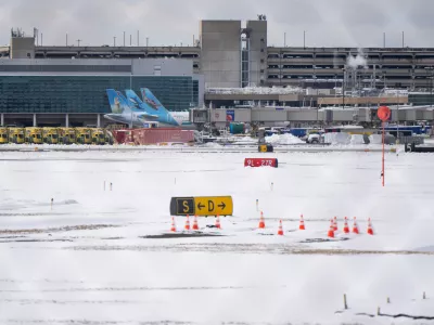 The Philadelphia International Airport following Sunday's snowfall on Monday, Feb. 23, 2026, in Philadelphia. (AP Photo/Joe Lamberti)
