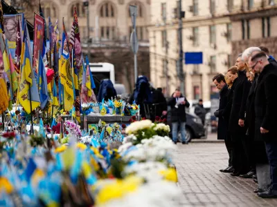 Denmark's Prime Minister Mette Frederiksen, third from left, President of Ukraine Volodymyr Zelenskyy participate in a memorial ceremony for fallen soldiers at Maidan Square in Kyiv, Ukraine, Tuesday, Feb. 24, 2026. (Mads Claus Rasmussen/Ritzau Scanpix via AP)