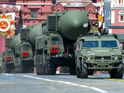 FILE - In this file photo taken on Wednesday, June 24, 2020, Russian RS-24 Yars ballistic missiles roll in Red Square during the Victory Day military parade marking the 75th anniversary of the Nazi defeat in Moscow, Russia. Russia and the United States exchanged documents Tuesday Jan. 26, 2021, to extend the New START nuclear treaty, their last remaining arms control pact, the Kremlin said. The Kremlin readout of a phone call between U.S. President Joe Biden and Russian President Vladimir Putin said they voiced satisfaction with the move. (AP Photo/Alexander Zemlianichenko, File)