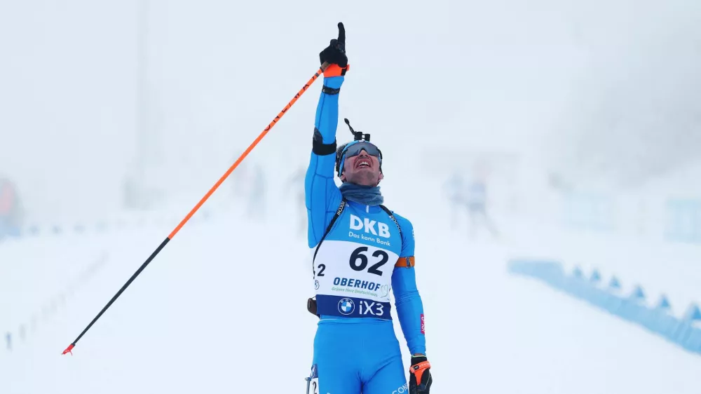 Biathlon - Biathlon World Cup - Oberhof, Germany - January 8, 2026 Italy's Tommaso Giacomel celebrates after winning the men's 10km sprint REUTERS/Matthew Childs