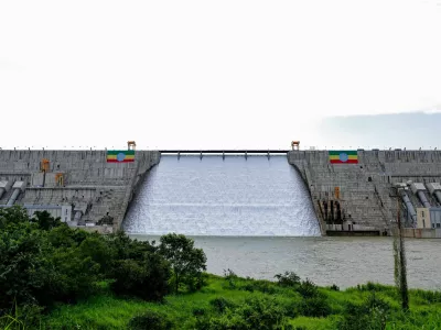 Large Ethiopian flags are displayed on the Grand Ethiopian Renaissance Dam (GERD), built along the Blue Nile, during its inauguration, in Guba, Benishangul-Gumuz region, Ethiopia, September 9, 2025. REUTERS/ Tiksa Negeri