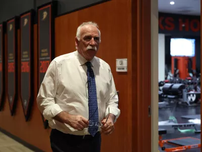 Feb 25, 2026; Anaheim, California, USA; Anaheim Ducks head coach Joel Quenneville walks on a hallway after winning his 1,000th career coaching victory with a 6-5 win over the Edmonton Oilers at Honda Center. Mandatory Credit: Kiyoshi Mio-Imagn Images