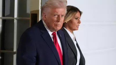 President Donald Trump and first lady Melania Trump, walk out of the White House, Tuesday, Feb. 24, 2026, to travel to the U.S. Capitol where he will deliver the State of the Union address to a joint session of Congress in the House chamber, in Washington. (AP Photo/Manuel Balce Ceneta)