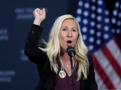 FILE - Rep. Marjorie Taylor Greene, R-Ga., speaks before Republican presidential nominee former President Donald Trump at a campaign event at the Cobb Energy Performing Arts Centre, Oct. 15, 2024, in Atlanta. (AP Photo/John Bazemore, File)
