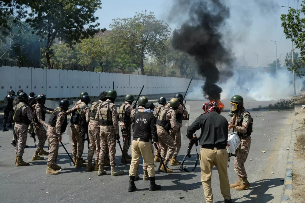 Security forces fire teargas to disperse the protesters outside the U.S. Consulate General, following news of U.S. and Israeli strikes on Iran that killed Iran's Supreme Leader Ayatollah Ali Khamenei,&nbsp;in Karachi, Pakistan&nbsp;March 1, 2026. REUTERS/Imran Ali