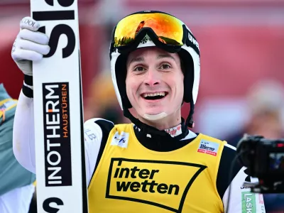 Ski Jumping - FIS Ski Jumping World Cup - Kulm, Tauplitz, Austria - March 1, 2026 Slovenia's Domen Prevc celebrates after winning the men's individual hs235 REUTERS/Christian Bruna
