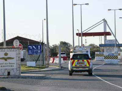 An emergency vehicle passes by the entrance of RAF Akrotiri, a British sovereign base in Cyprus, which was hit by an unmanned drone overnight, causing limited damage, Cyprus March 2, 2026. REUTERS/Yiannis Kourtoglou