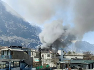 Smoke rises from the premises of the U.N. office, after it was set ablaze by protesters, following news of U.S. and Israeli strikes on Iran that killed Iran's Supreme leader Ayatollah Ali Khamenei, in the city of Gilgit, Gilgit Baltistan, Pakistan March 1, 2026. Picture taken with a mobile phone. REUTERS/Mubarak Hussain
