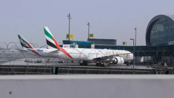 Planes are parked at Terminal 3 of the Dubai International Airport, following the United States and Israel strikes on Iran, in Dubai, United Arab Emirates, March 2, 2026. REUTERS/Raghed Waked