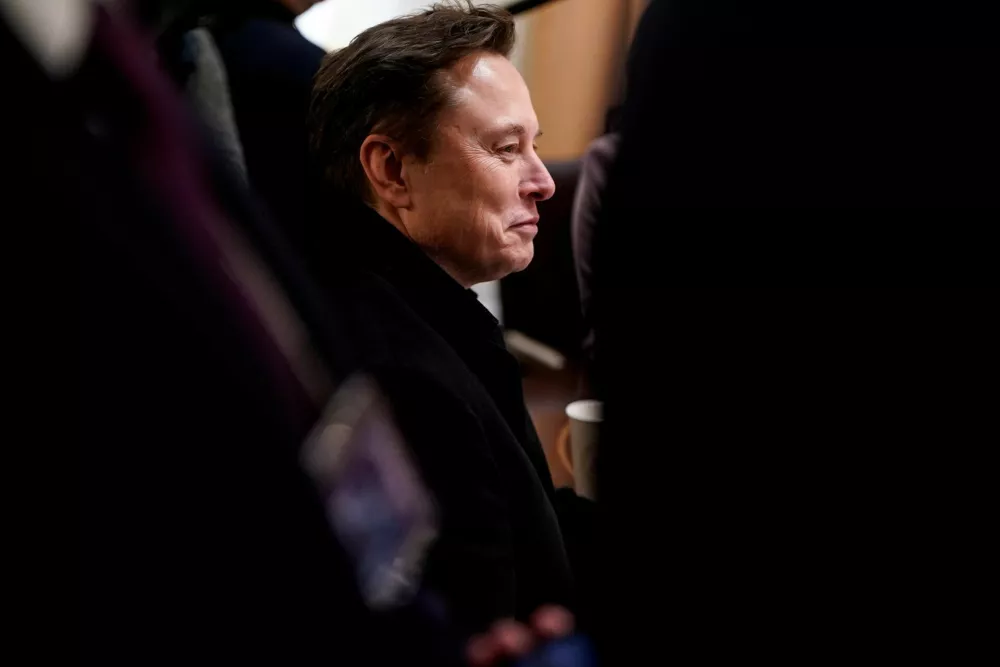 FILE PHOTO: Elon Musk attends a cabinet meeting at the White House in Washington, D.C., U.S., April 10, 2025. REUTERS/Nathan Howard/File Photo