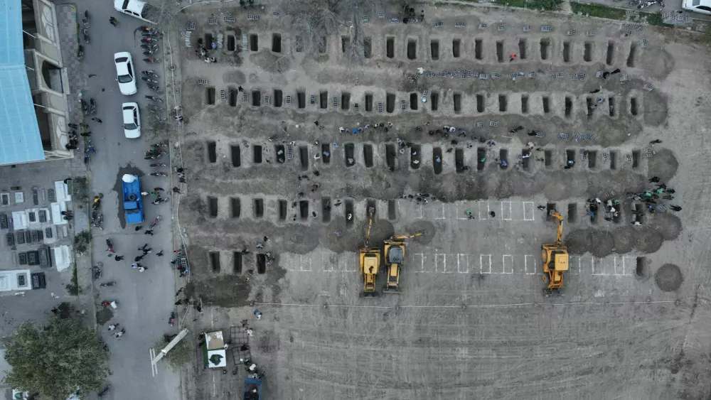 Graves are being prepared for the victims following an Israeli strike on a school in Minab, Iran, March 2, 2026. Iranian Foreign Media Department/WANA (West Asia News Agency)/Handout via REUTERS ATTENTION EDITORS - THIS PICTURE WAS PROVIDED BY A THIRD PARTY.