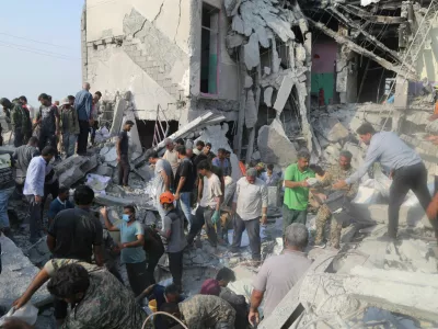 FILE PHOTO: People and rescue forces work following an Israel strike on a school in Minab, Iran, February 28, 2026. Abbas Zakeri/Mehr News/WANA (West Asia News Agency) via REUTERS ATTENTION EDITORS - THIS PICTURE WAS PROVIDED BY A THIRD PARTY/File Photo